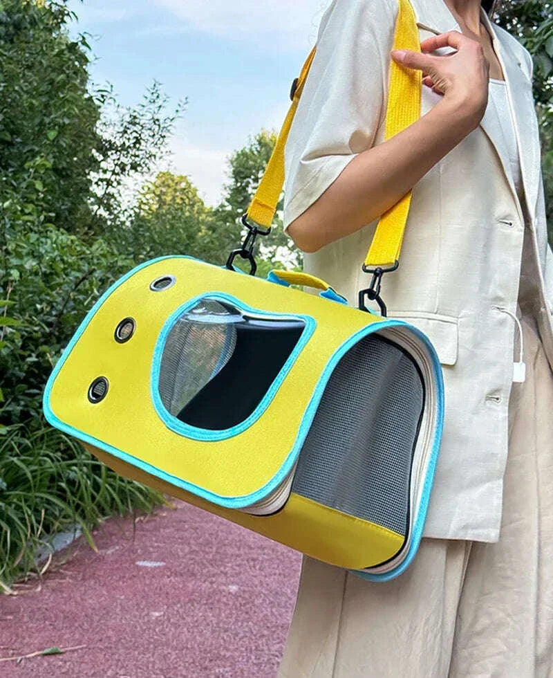 Sac de portage jaune vif pour chat à contour turquoise, sangle jaune à l'épaule