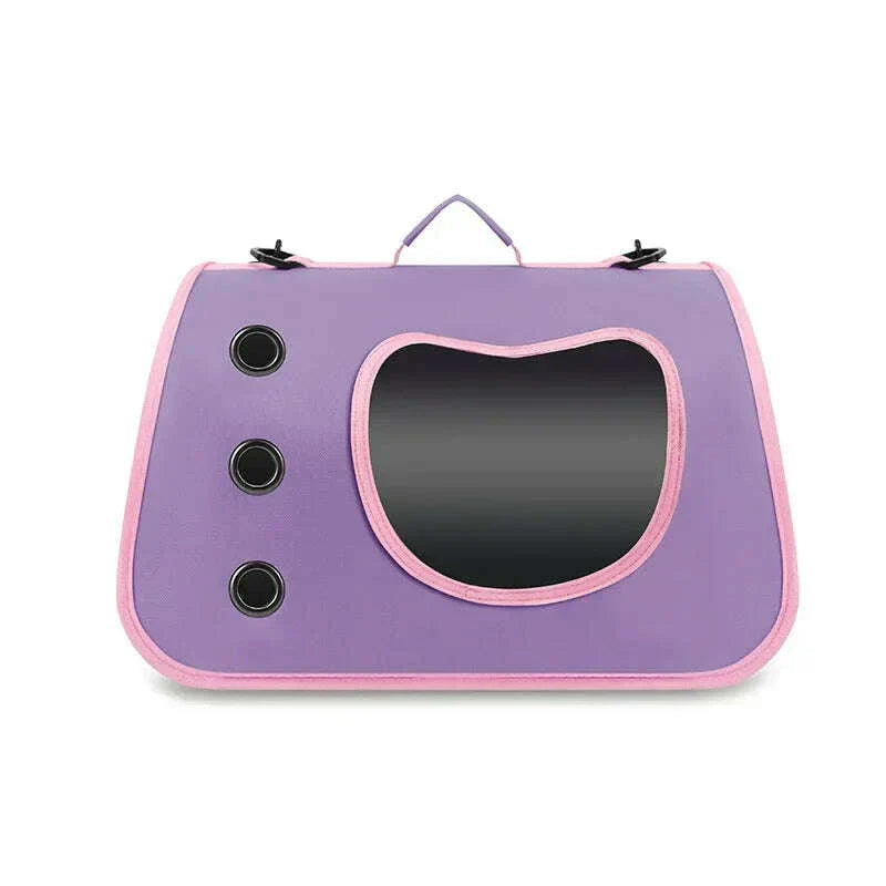 Sac de transport violet lilas pour chat à bordure rose, vu de face avec poignée, hublot transparent et trois œillets