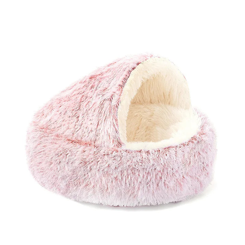 Igloo pour chat en peluche rose pâle à poils longs, intérieur crème, sur fond blanc