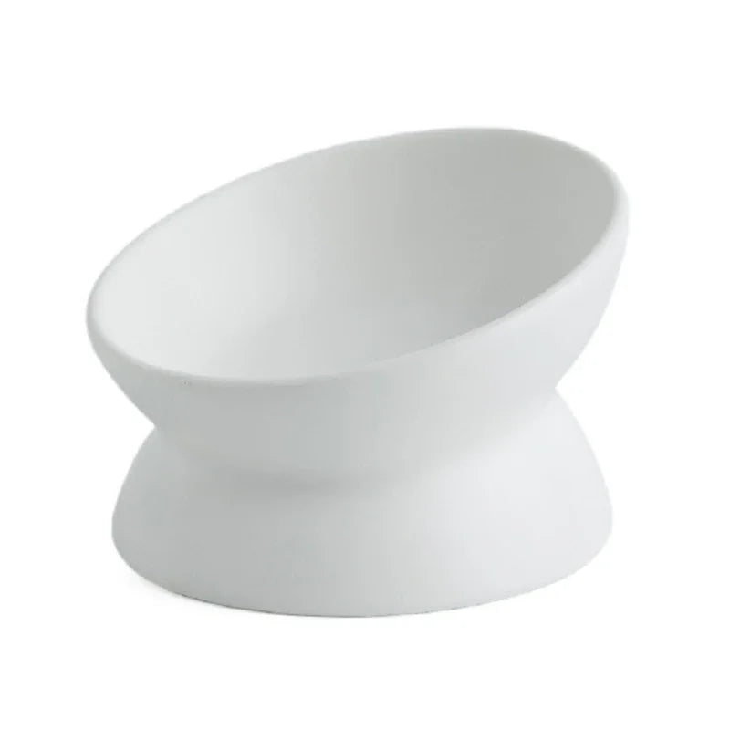 White version of the tilted cat bowl on a pedestal, satin matte finish, white background