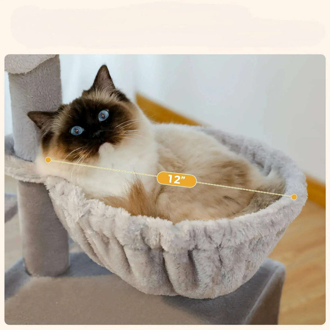 Hamac en peluche grise de 12 pouces de diamètre occupé par un chat aux yeux bleus, avec la cote indiquée sur l'image