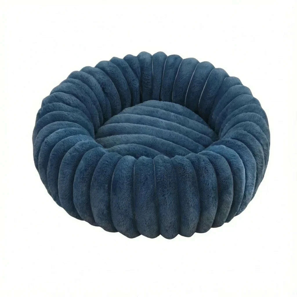 Panier rond pour chat en peluche bleu pétrole à bourrelet côtelé, vue de dessus sur fond blanc