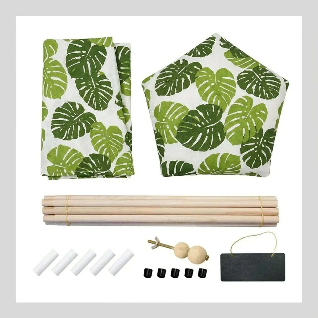 Contenu du kit du tipi : toile et coussin pentagonal à feuilles, cinq mâts en bois, ardoise et embouts