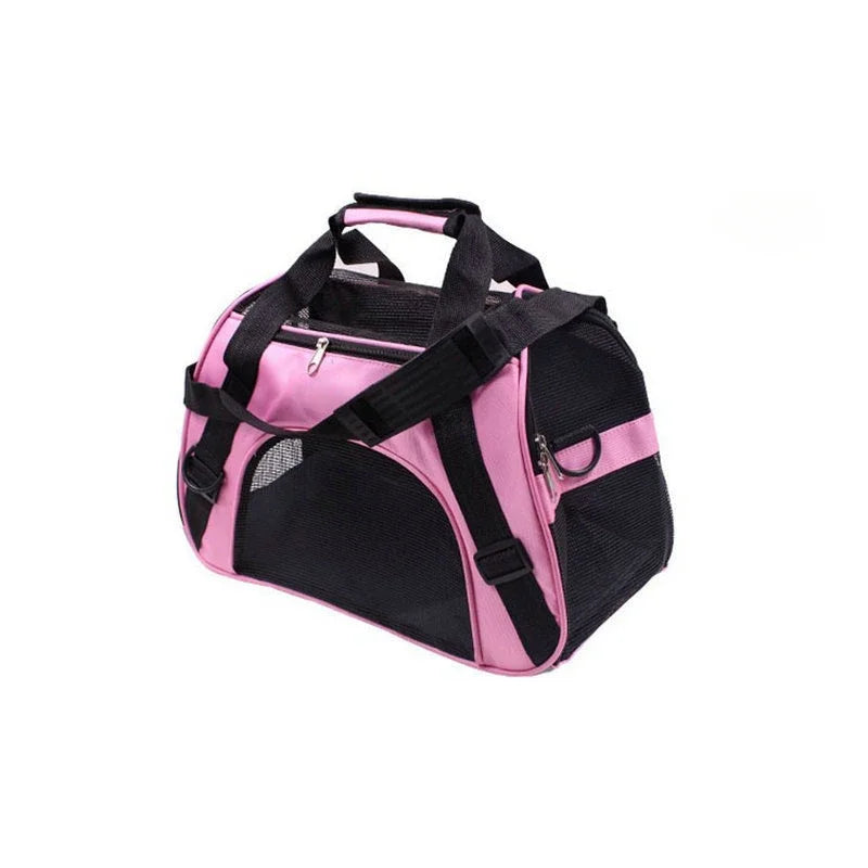 Sac tote rose pâle et noir pour chat sur fond blanc, vu en trois quarts avec bandoulière et anneau