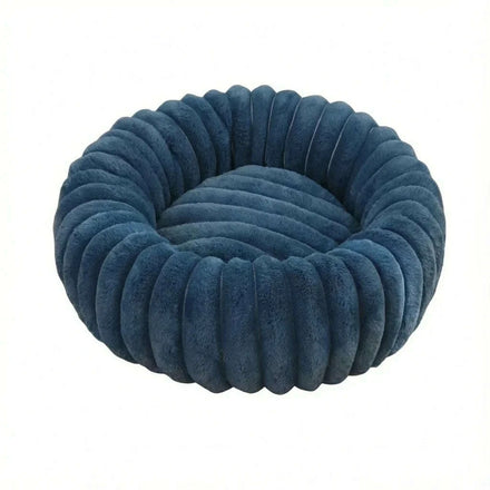 Panier rond pour chat en peluche bleu pétrole à bourrelet côtelé, vue de dessus sur fond blanc